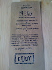 The wedding-day menu, also designed by the bride, listed the organic and local fare.