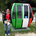 Leah posing beside the Cable Car in Ngong Ping