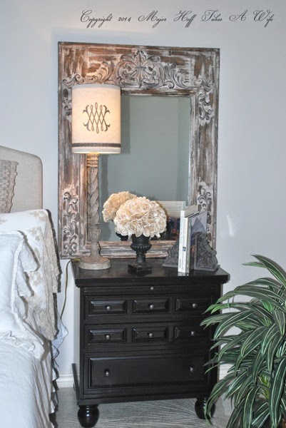 Bun feet black nightstand with lamp and tin surround mirror.jpg Bun feet black nightstand with lamp and tin surround mirror