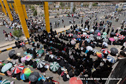 People wait for the sermon to begin. Friday prayer on 60 Meter Rd, Sana'a, Yemen جمعة الوفاء لأبين  في شارع الستين بصنعاء