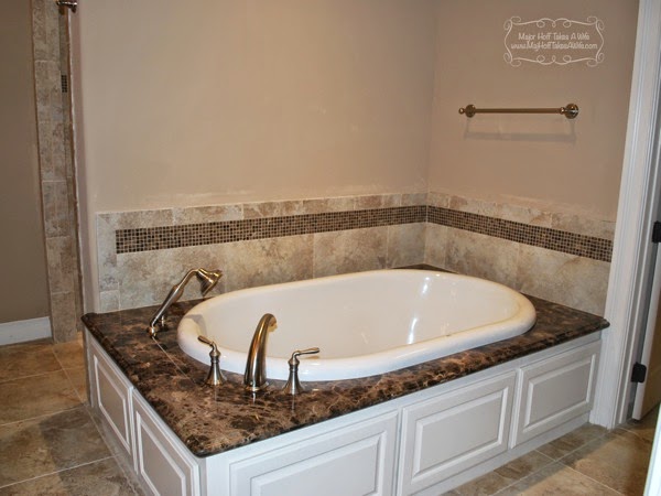 Master bath tub with shower sprayer and mosaic tile.jpg Master bath tub with shower sprayer and mosaic tile