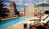 Relax poolside while you sip a cocktail at the Rooftop Pool & Café.