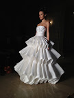 Pleats, please: How dramatic is the silhouette on this strapless number?