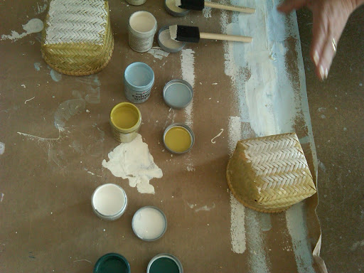 Here, we tested out paint colors on the baskets from Pearl River.