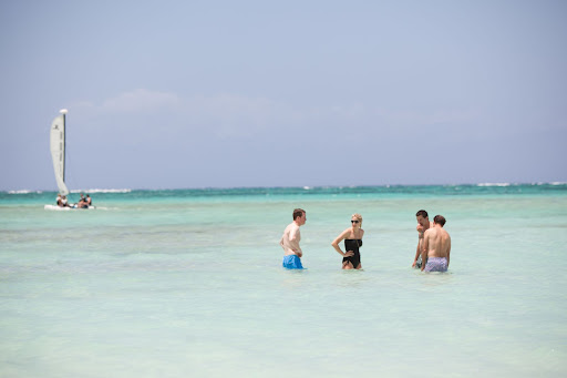 Everyone enjoyed the warm ocean waters. Everyone enjoyed the warm ocean waters.