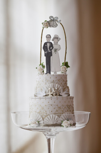 This D Sharp paper cake topper added some wedding flair to the dessert table.