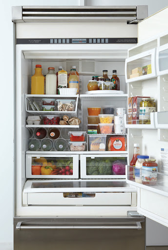 This is the dream refrigerator! The Container Store, Bed Bath and Beyond, Martha Stewart Collection For Macy's, and Snapware have some wonderful storeage pieces for your refrigerator -- like clear leftover containers, soda holders, wine racks, and shelf risers.