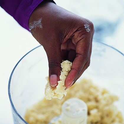 Add 1/4 cup ice water and pulse until dough just holds together when squeezed. (If needed, add up to 4 tablespoons more ice water, 1 tablespoon at a time. Do not overmix! Add 1/4 cup ice water and pulse until dough just holds together when squeezed. (If needed, add up to 4 tablespoons more ice water, 1 tablespoon at a time. Do not overmix!