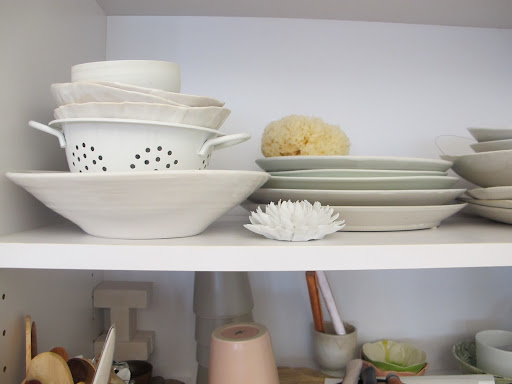 She collects and surrounds herself with beautiful objects.