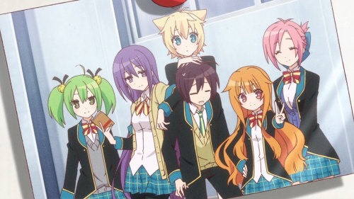 A photo of the main cast standing together in a group shot