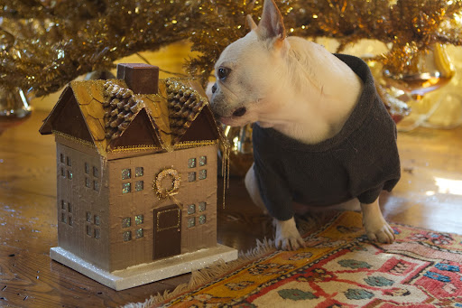 This looks like a fancy gingerbread house, but I don't think it's actually gingerbread.  It doesn't smell good enough to eat.