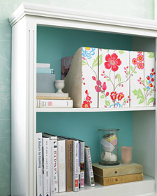 Inexpensive magazine holders get a romantic upgrade with a pretty floral paper. (Martha Stewart Living) Inexpensive magazine holders get a romantic upgrade with a pretty floral paper. (Martha Stewart Living)