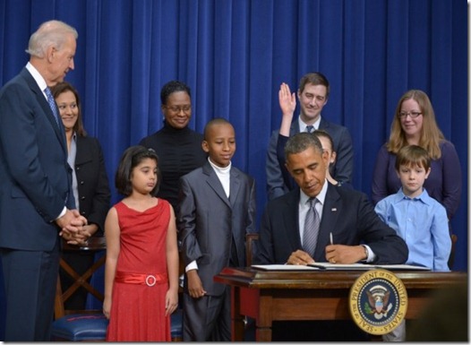 Obama-gun-measures- with kids present 1-16-13