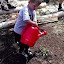 Red watering can.JPG