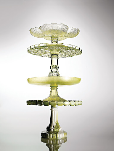 Citrine hues, including bold Vaseline (a reference to the petroleum jelly, second from top), are prime picks for collectors. An iridescent piece, third from top, has the appearance of Tiffany glass. Citrine hues, including bold Vaseline (a reference to the petroleum jelly, second from top), are prime picks for collectors. An iridescent piece, third from top, has the appearance of Tiffany glass.