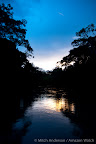 Departing Achuar terriitory, a peaceful sunset on the Huitoyaco river.