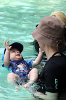 Oscar swimming with Mum