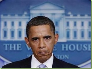 Barack_Obama_Frowning_in_Front_of_White_House_Seal