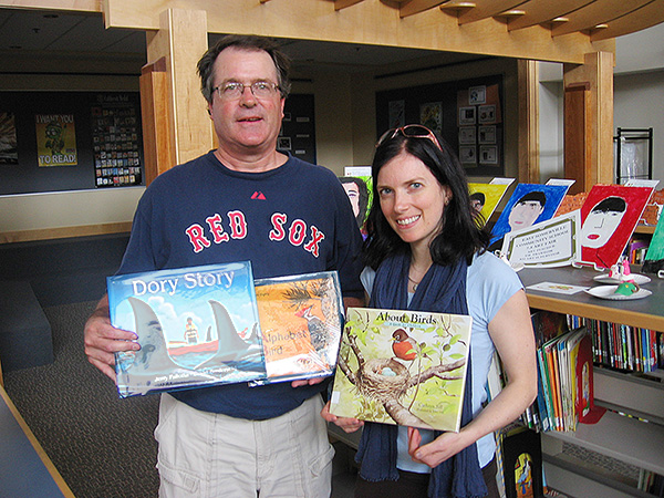 BBC Board Member David Williams presenting the books to Librarian Norah Connelly