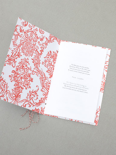 I also used the pattern on the interior of the ceremony booklet and bound the book together using pastry twine. I also used the pattern on the interior of the ceremony booklet and bound the book together using pastry twine.