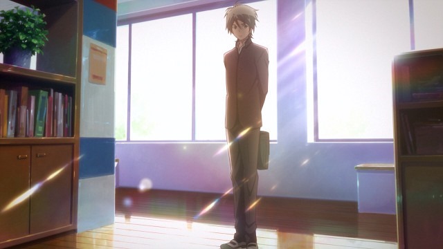 Ryouichi stands holding his schoolbag behind him in the school hallway waiting to be introduced to his new class