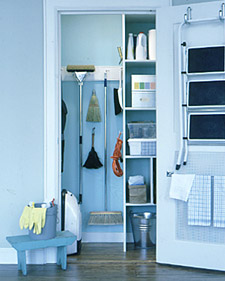 To help avoid clutter in a broom closet, make sure you only have what you need, nothing more. Use the wall and shelves to help keep the floor clear and group cleaning supplies by what room they're used in.