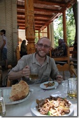 Andy enjoying Beer and a plate of the Uzbekistan dish, Jiz
