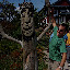 Some Tiki guy and Kyle giving him a high five