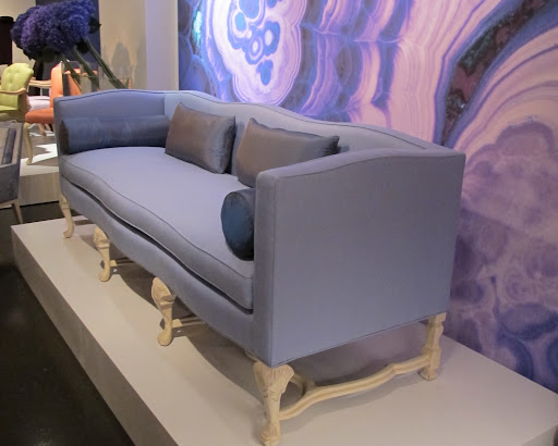 This neo-baroque fabulous violet sofa is such a burst of lively color against that gemstone wall art. This neo-baroque fabulous violet sofa is such a burst of lively color against that gemstone wall art.