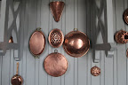 Copper has long been used for pots and pans because it's an excellent conductor and retainer of heat.  But, because it's quite costly, some pots are made with only copper bottoms, making them more affordable.