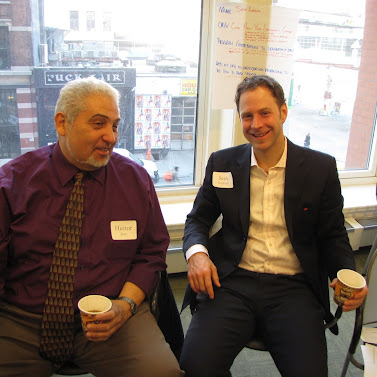 Hector Soto from the Center for Neighborhood Leadership and Seth Hufford from the Coro Fellowship Program talk at an RCLA event for leadership program directors.