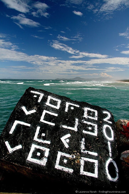 Foreign symbols on rock