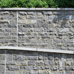 9 - Walls of squared rubble stone and wall coping