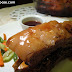 A mouth-watering view of Baby Back Ribs at Pepper & Peppers