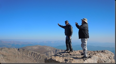 Mel & Chuck taking pics at summit of Mt. Evans