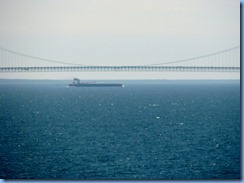 3433 Michigan Mackinac Island - view of Mackinac Bridge and freighter from Grand Hotel 3433 Michigan Mackinac Island - view of Mackinac Bridge and freighter from Grand Hotel