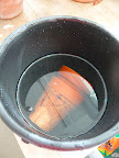 The clay and plastic pots were scrubbed clean and the clay and coir are soaked in water to keep them from wicking away all the moisture in the potting mix