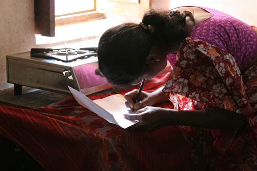 She was so moved by YGB’s support. Here is Jayashree signing the document to receive it.