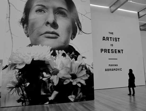Marina-Abramovic-The-Artist-is-Present-2001-MoMA-installation-view-Portrait-with-Flowers-2009