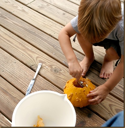 Scooping out pumpkin