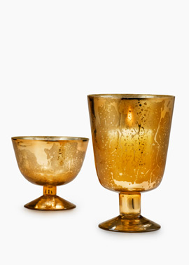Antiqued copper pedestal vases.