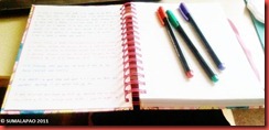 notebook and colorful pens