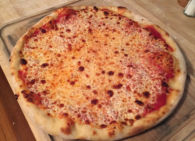 Image of baked pizza out of the oven.