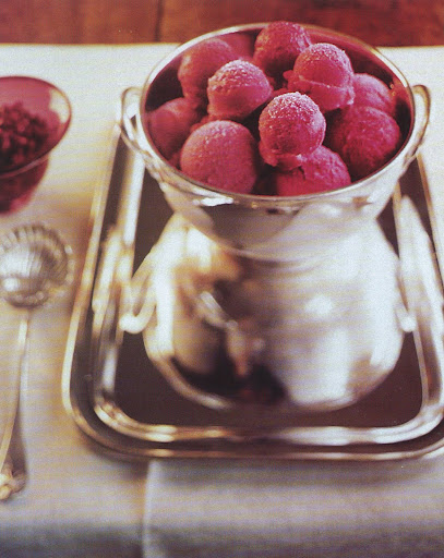 Served for dessert is pomegranate and apple-cider sorbet; pomegranate seeds, in the bowl are sprinkled on each portion. Served for dessert is pomegranate and apple-cider sorbet; pomegranate seeds, in the bowl are sprinkled on each portion.