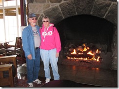 Barney and Betty in front of the Crater Lake Lodge fireplace