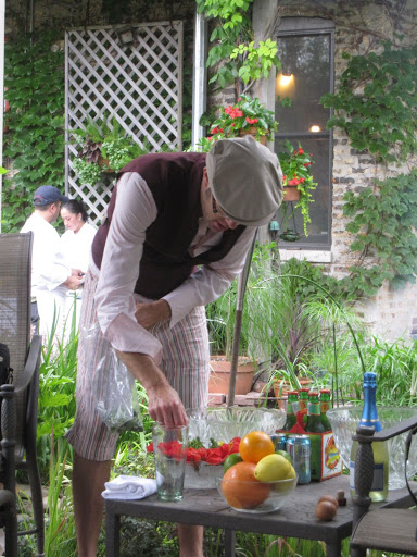 Mixologist Adam Seger carefully preparing his ingredients. Mixologist Adam Seger carefully preparing his ingredients.