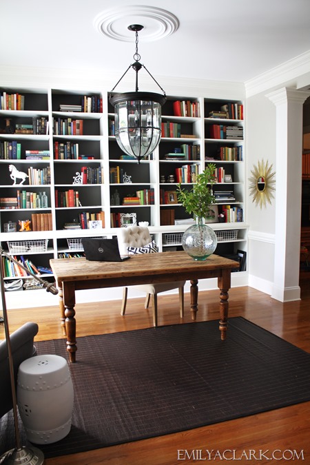 home office with built-in bookshelves