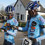 Ethiopian riders on Marco Polo Cycling Donckers Koffie, Binyam Bekele and Alem Abebe pinning their numbers at a race in Europe. (photo: Remko Kramer)