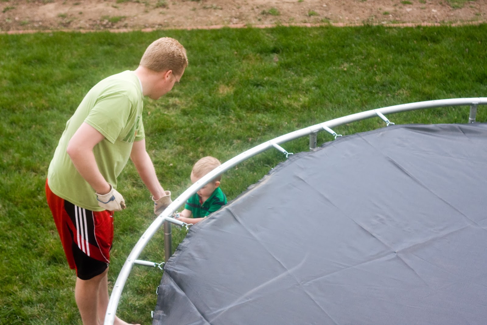 [05-10-13_dan-and-jacob-putting-tramp%255B2%255D.jpg]