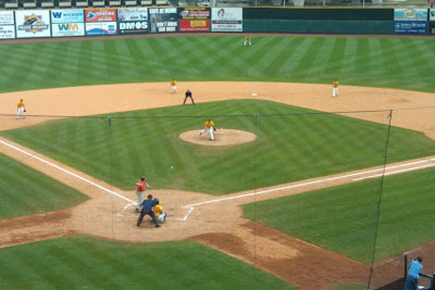 Kellen Glover fires a pitch towards home.